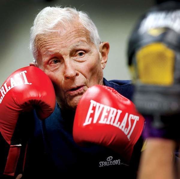 Man with boxing gloves doing box fit for seniors at Living Well Centre, Christchurch