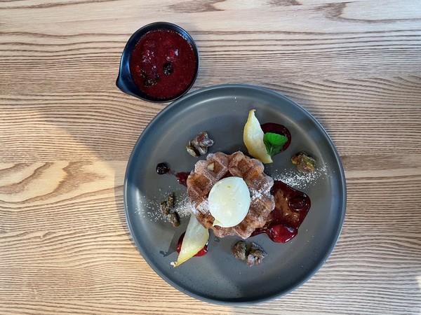 Plate of Belgian Waffles with fruit compote