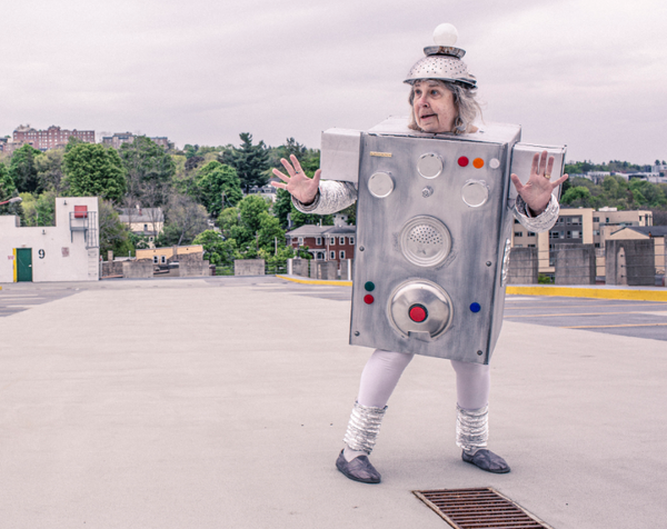 A funny robotic tin man in the street