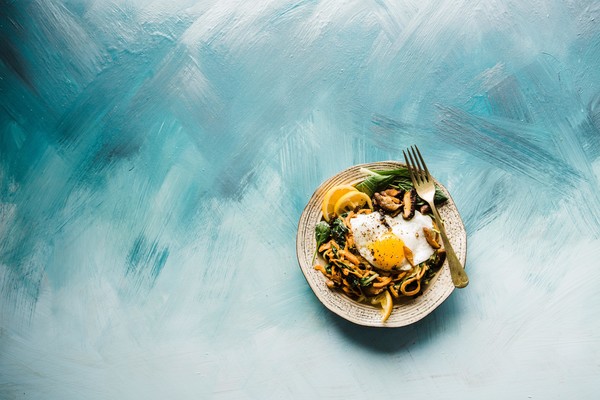 Delicious bowl of pasta and spinach for how you can get the best nutritional bang for your buck